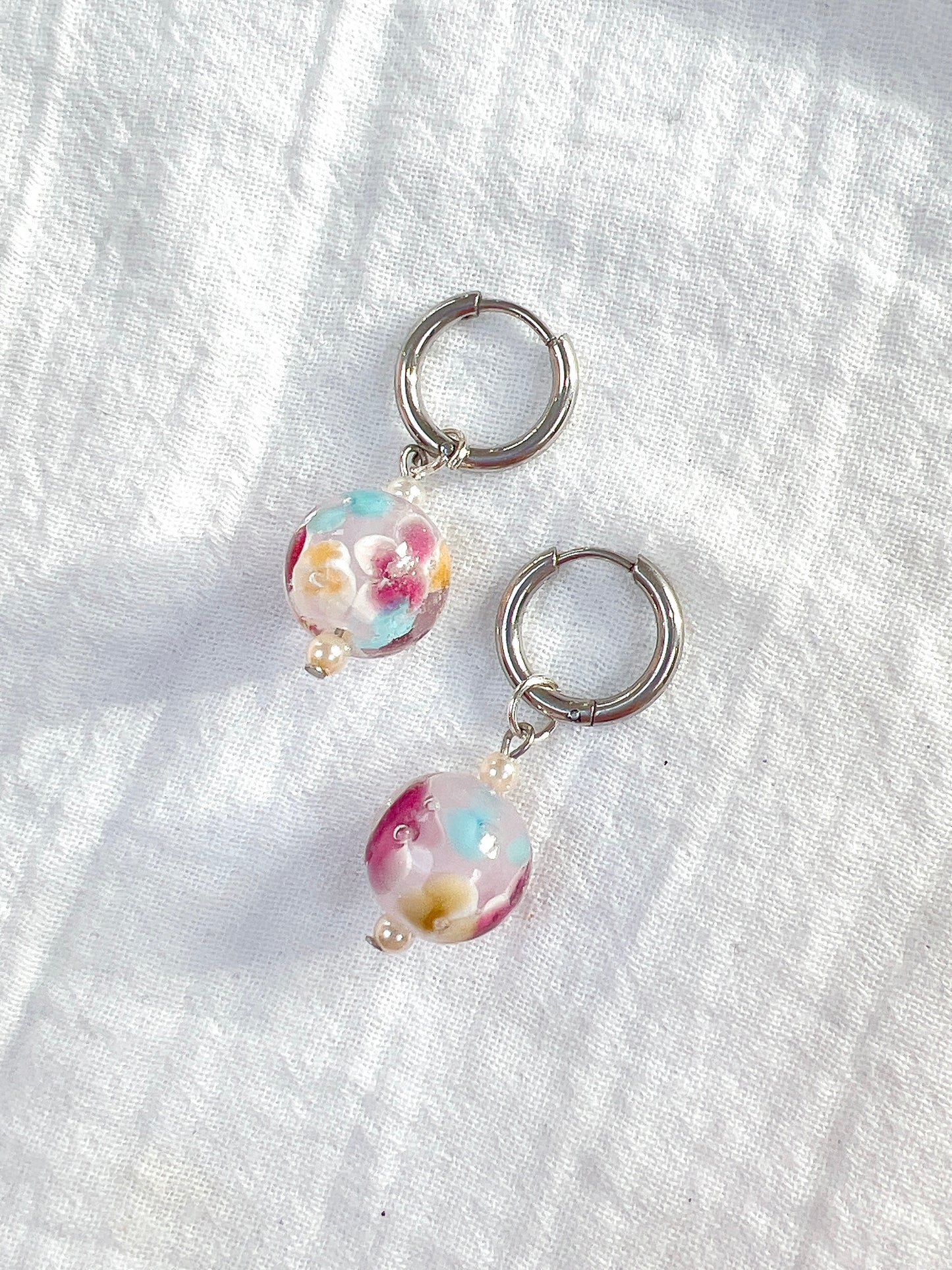 “Femme” - Floral Glass Charm on Huggie Hoops in Silver