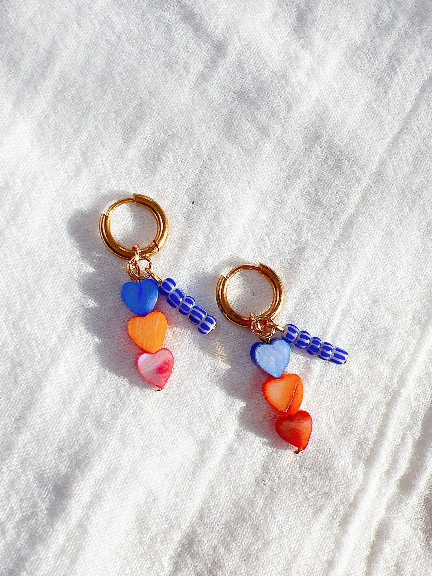 “Santorini” - Triple Heart Gold Huggie Hoops