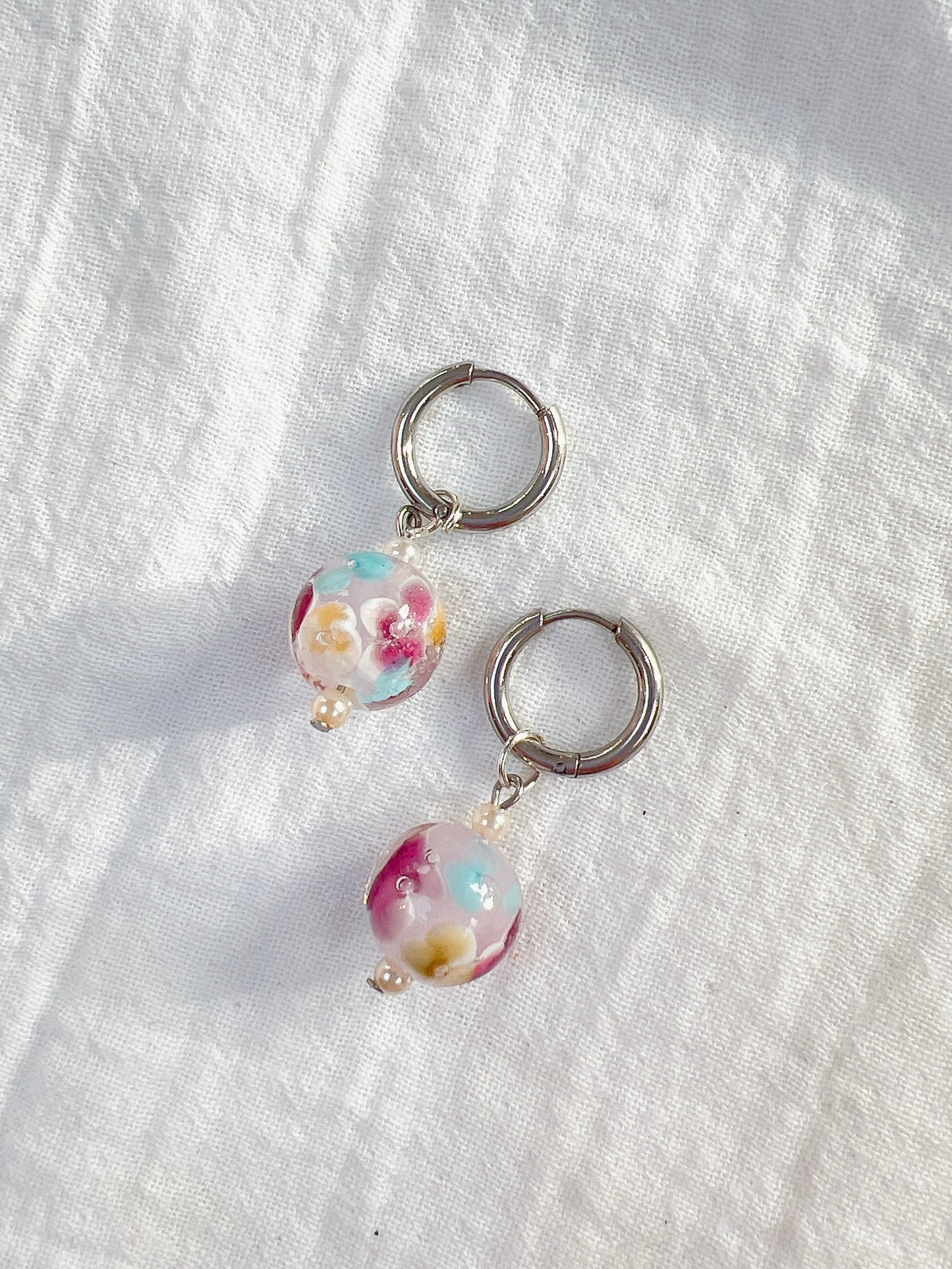 “Femme” - Floral Glass Charm on Huggie Hoops in Silver