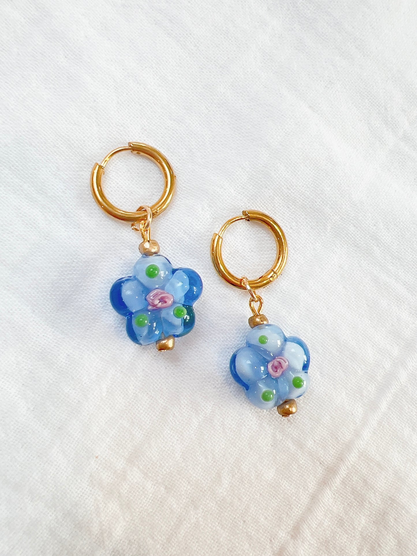 “Belle” - Floral Blue Glass on 10mm Gold Hoops