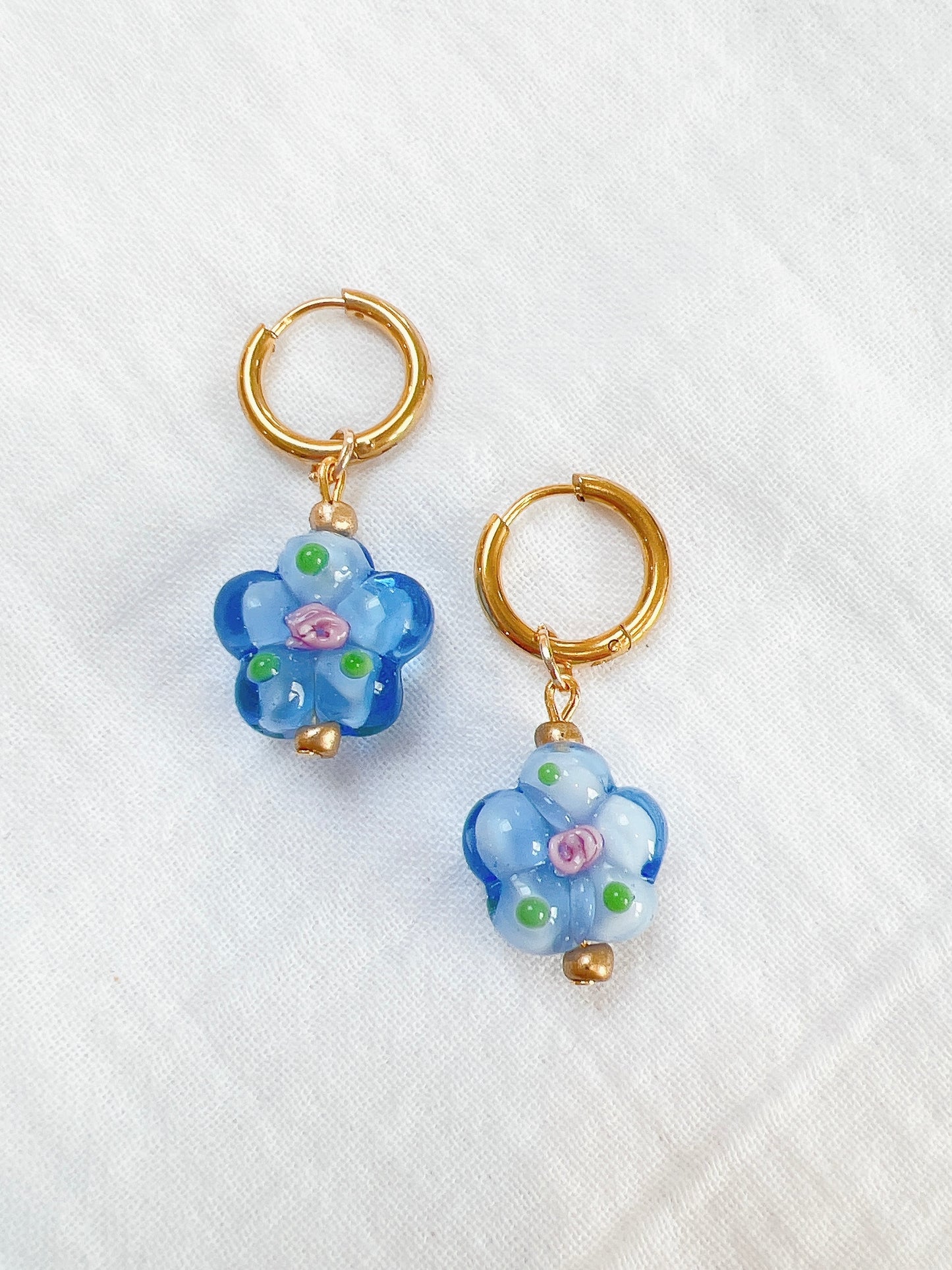 “Belle” - Floral Blue Glass on 10mm Gold Hoops