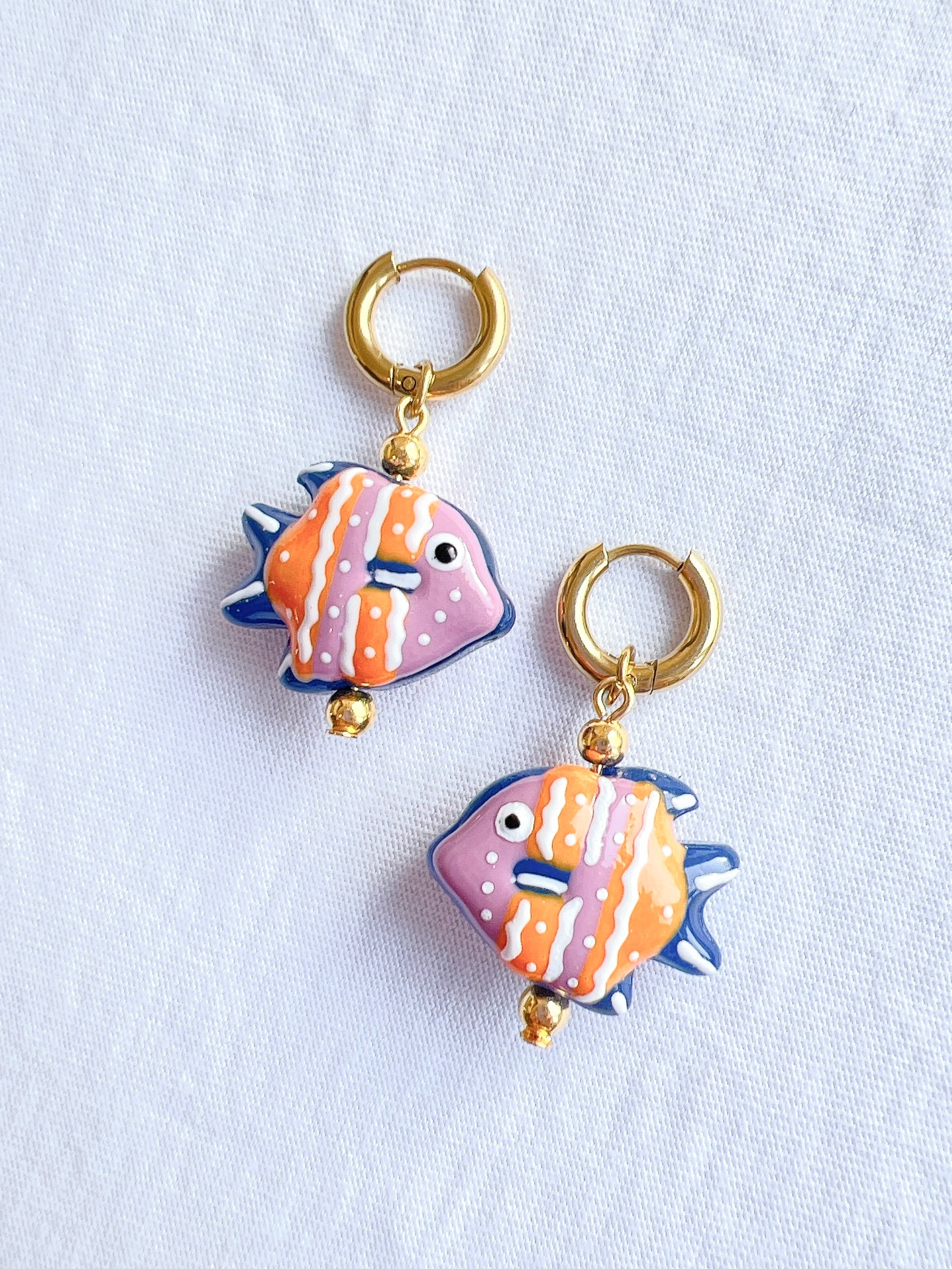 “Something Fishy” - Fish Earrings in Pink and Blue in a Gold Huggie Hoop